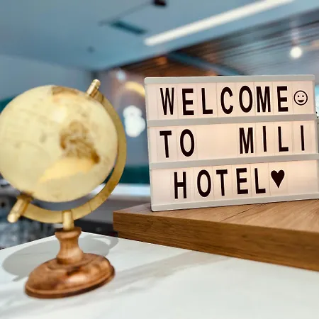 Mili *