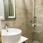Mili *
