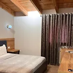 Mili *