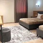 Mili *